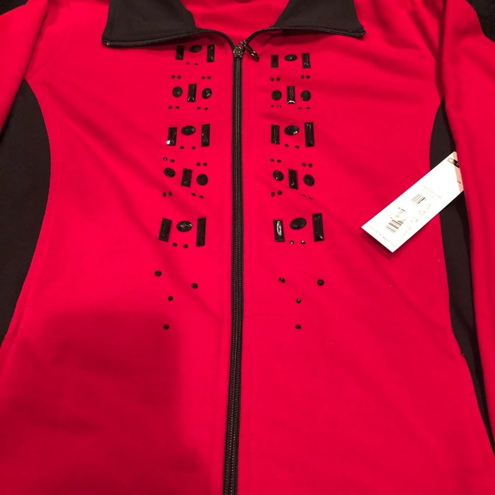 AC -ology shirt with black Gems on front